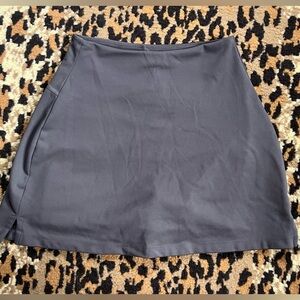 Girlfriend Collective sporty skort in heather/light purple